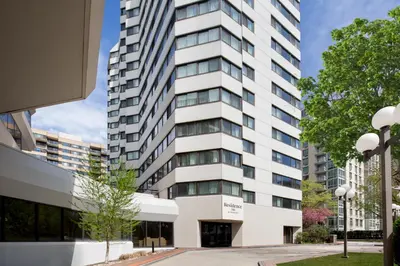 a tall white building with windows at Residence Inn White Plains Westchester County in White Plains