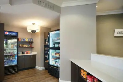 a store with an open refrigerator in a room at Residence Inn by Marriott Albany East Greenbush/Tech Valley in East Greenbush