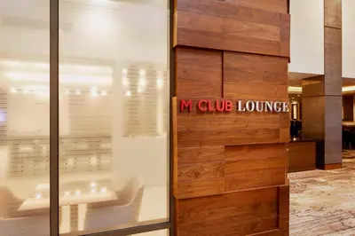 a sign that reads my club lounge is on a wall at Marriott Hartford/Windsor Airport in Windsor