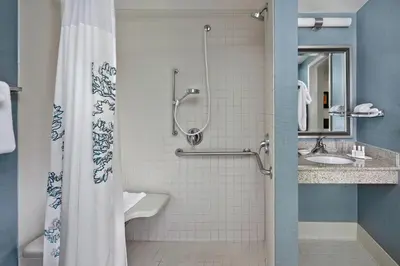 a bathroom with a shower and a sink at Residence Inn Hartford Avon in Avon