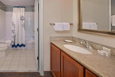 a bathroom with a sink and a toilet at Residence Inn Hartford Avon in Avon
