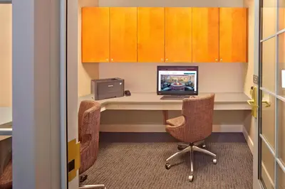 an office with a desk with a laptop and a computer at Residence Inn Hartford Avon in Avon