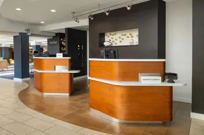 a lobby with a counter in a store at Courtyard Hartford Cromwell in Cromwell