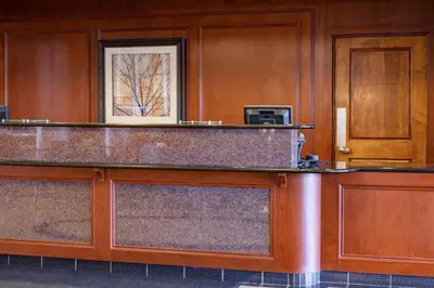 a reception counter in a hotel room at Courtyard Hadley Amherst in Hadley