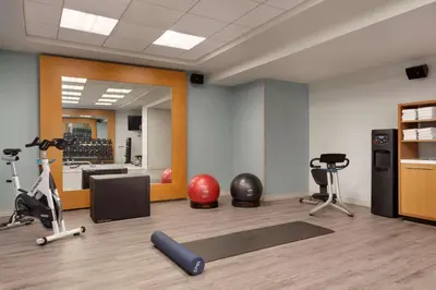 a gym with exercise equipment in a room at DoubleTree by Hilton New York Downtown in New York