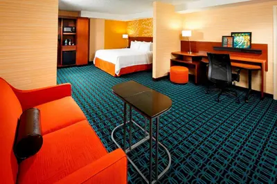 a hotel room with a bed and a desk at Fairfield Inn by Marriott East Rutherford Meadowlands in East Rutherford