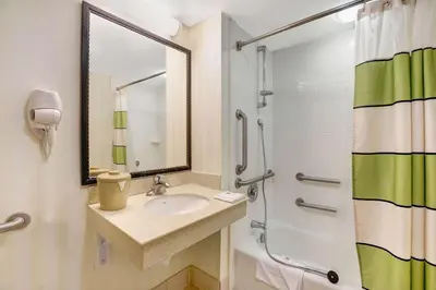 a bathroom with a sink and a shower at Motel 6-Milford, CT in Milford
