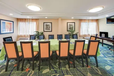 a conference room with a large table and chairs at Motel 6-Milford, CT in Milford