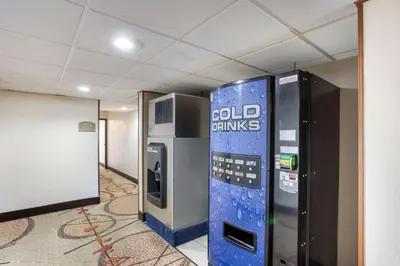 a cold drinks vending machine in a room at Quality Inn Albany Colonie in Albany