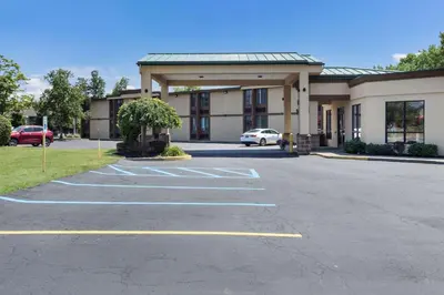 a parking lot in front of a hotel at Quality Inn Albany Colonie in Albany