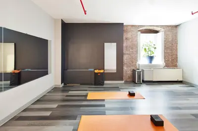 a large room with a table and two sinks at HI New York City Hostel in New York