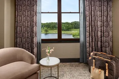 a living room with a couch and a window at Mount Airy Casino Resort - Adults Only 21 Plus in Mount Pocono