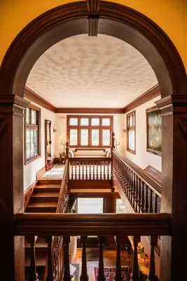 an archway leads into theoyer of a house at Manor House Inn in Norfolk
