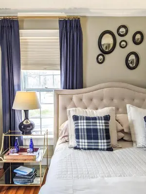 a bedroom with a white bed and a window at Stagecoach Inn in Goshen
