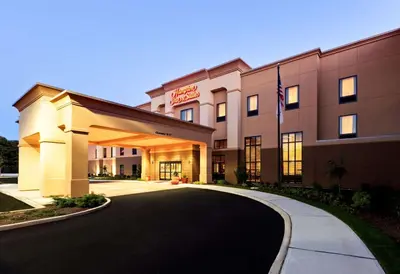 a rendering of a hotel with a driveway at Hampton Inn & Suites Mahwah in Mahwah