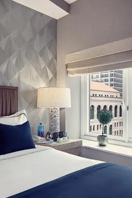 a bedroom with a large bed and a window at Artezen Hotel in New York