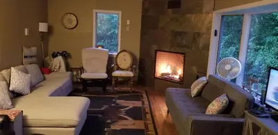 a living room with a couch and a fireplace at Hunter Mt Amazing Views Catskills! 5 Bedrooms! Best Choice! in Hunter