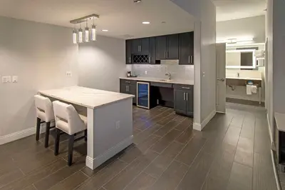 a kitchen with a table and chairs in a room at Hampton Inn & Suites Fairfield in Fairfield