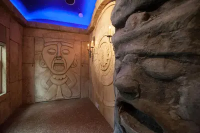 a room with a face on the wall at The Roxbury in Roxbury