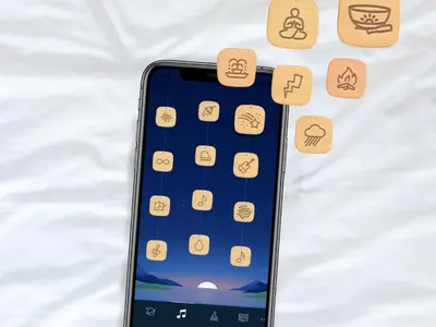 an iphone laying on a bed with icons on it at Sleep Inn & Suites Dunmore in Dunmore