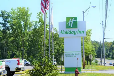 a sign for a hyundaiimantm dealership at Holiday Inn Poughkeepsie by IHG in Poughkeepsie