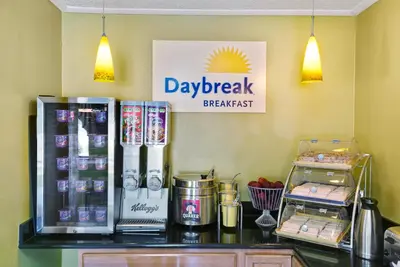 a dairy breach sign on the wall of a store at Days Inn by Wyndham Torrington in Torrington