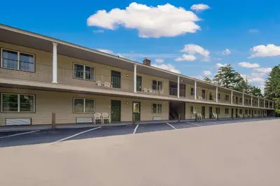 an empty parking lot in front of a building at Quality Inn Great Barrington in Great Barrington