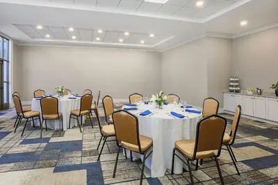 a conference room with tables and chairs in it at Sheraton Tarrytown Hotel in Tarrytown