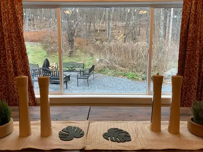 a window with a view of a patio outside at Starlite Motel & Suites in Big Indian