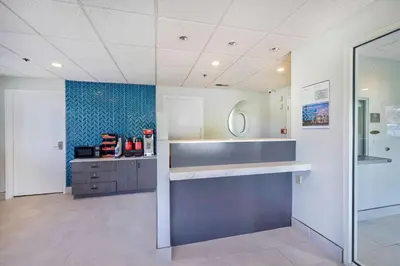a large room with a counter and a sink at Motel 6 Bethel, CT - Danbury in Bethel