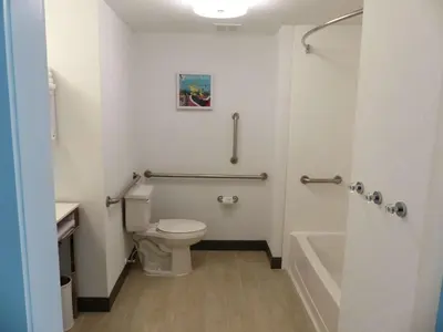 a bathroom with a toilet and a bath tub at Hampton Inn By Hilton Paramus in Paramus