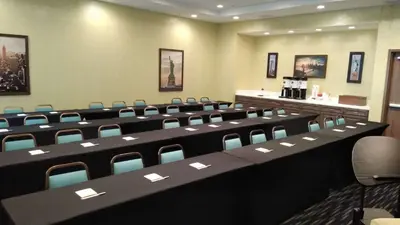 a conference room with desks and chairs in it at Hampton Inn By Hilton Paramus in Paramus