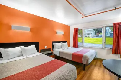 a hotel room with two beds and a window at Motel 6-Ilion, NY in Ilion