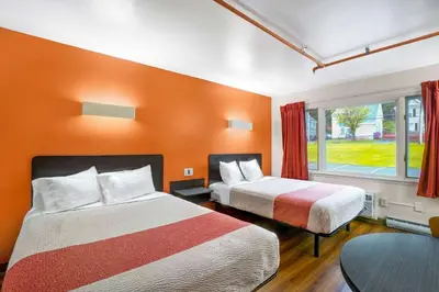 a hotel room with two beds and a window at Motel 6-Ilion, NY in Ilion