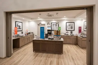 a large room with a counter in a store at Hampton Inn & Suites Rocky Hill - Hartford South in Rocky Hill