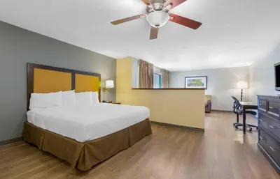a bedroom with a bed and a ceiling fan at Extended Stay America Suites - New York City - LaGuardia Airport in Queens