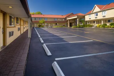 an empty parking lot in an apartment complex at Skyview Motel in Fort Lee