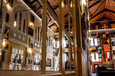 a view of a store through a glass window at Amsterdam Castle NY in Amsterdam