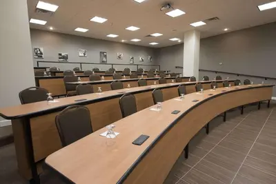 a large conference room with a long table and chairs at DoubleTree by Hilton Binghamton in Binghamton