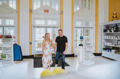 a man and a woman standing in a room at Gideon Putnam Resort & Spa in Saratoga Springs