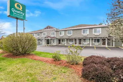 a building with a sign in front of it at Quality Inn Queensbury - Lake George Area in Queensbury
