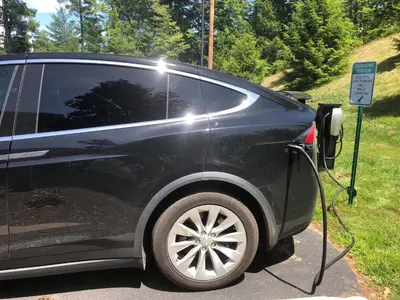 a car is plugged into a hydrogen fueling station at Country Inn & Suites by Radisson, Queensbury - Lake George , NY in Lake George