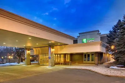 a building with a sign on the front of it at Holiday Inn Express Poughkeepsie by IHG in Poughkeepsie