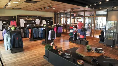 a clothing store with a lot of clothes on display at Resorts World Catskills in Monticello