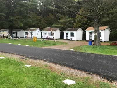 a road with a playground in a park at Catskill Motor Court in Catskill