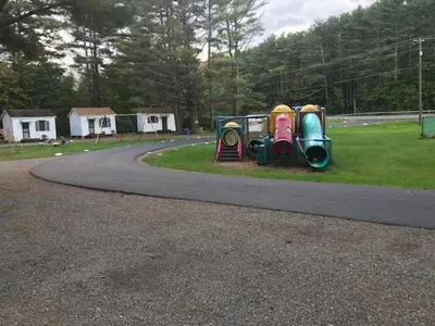 a group of playground equipment on the side of a road at Catskill Motor Court in Catskill