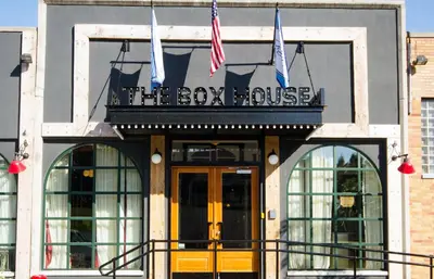 a building with a sign that reads the bow house at The Box House Hotel in Brooklyn