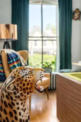 a figurine of a dog in a living room at Twin Gables of Woodstock in Woodstock