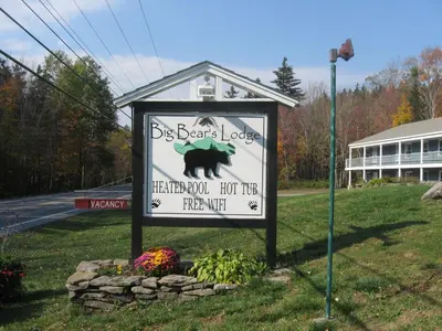 a sign for a bear house with a sign for a bear lover at Big Bears Lodge in West Dover