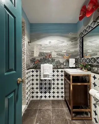 a bathroom with a sink and a painting on the wall at The Cornell Inn, Lenox & The Berkshires in Lenox